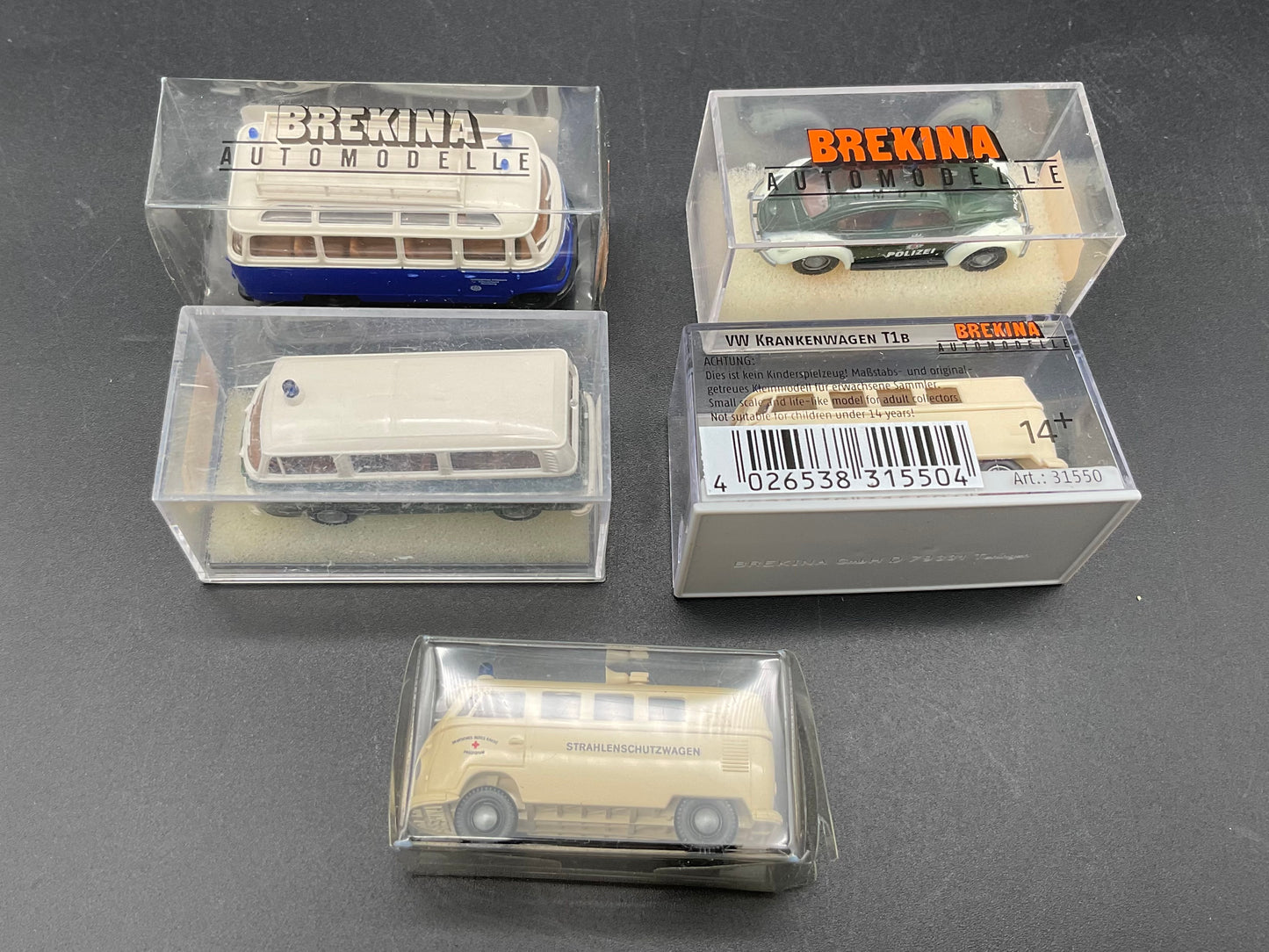 Fünf Brekina Einsatzfahrzeuge