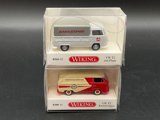 VW T2 mit Plane und VW T2 mit Kastenwagen