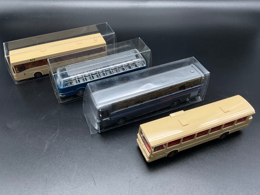 Vier Wiking Modellbusse