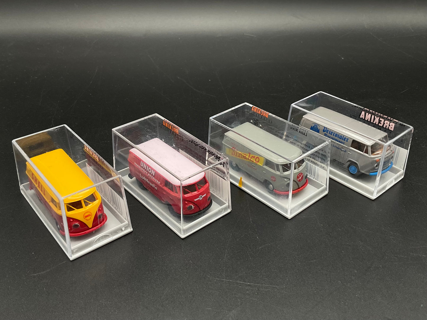 Vier Brekina Modellfahrzeuge