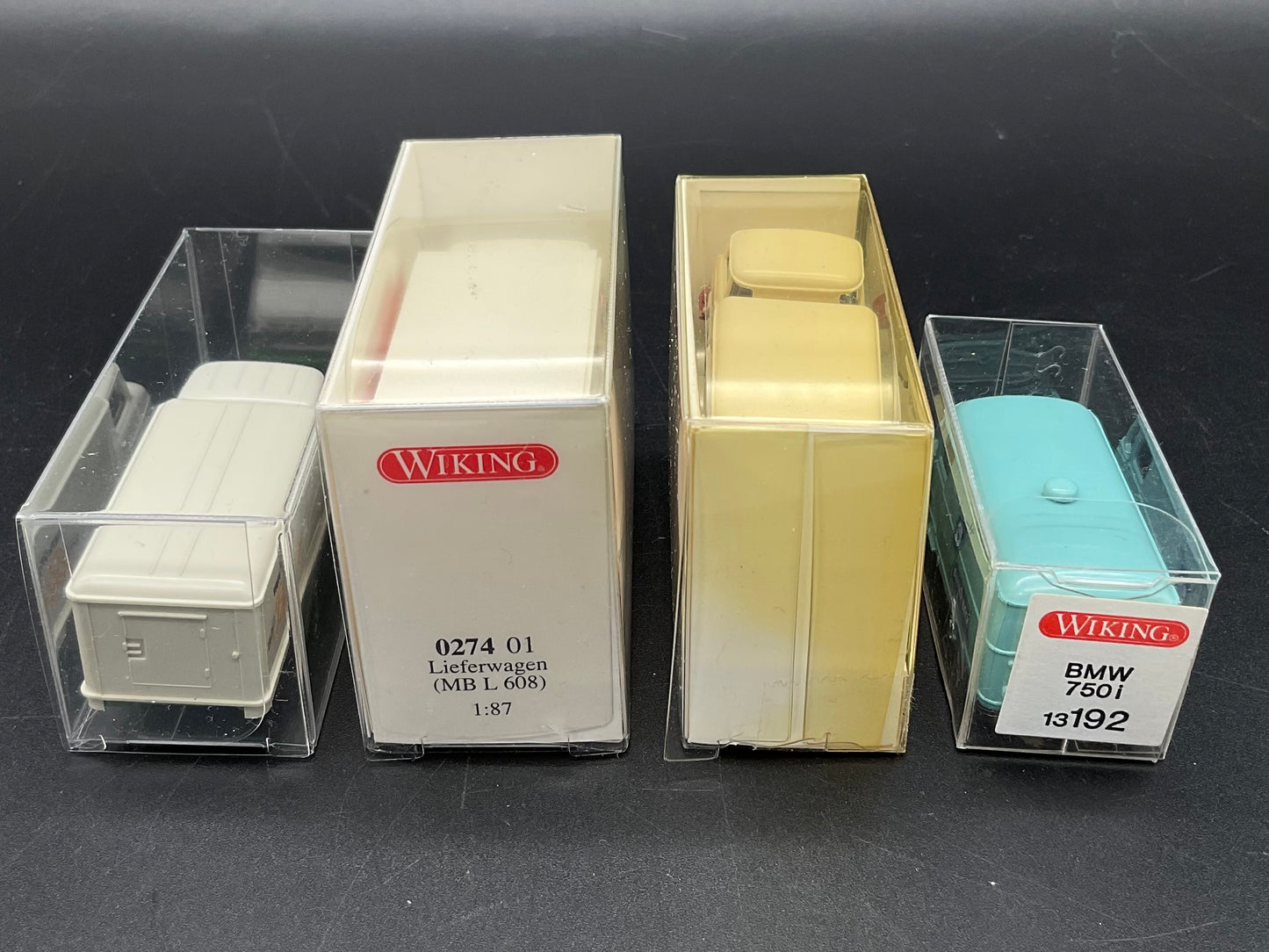Vier Transporter von Wiking