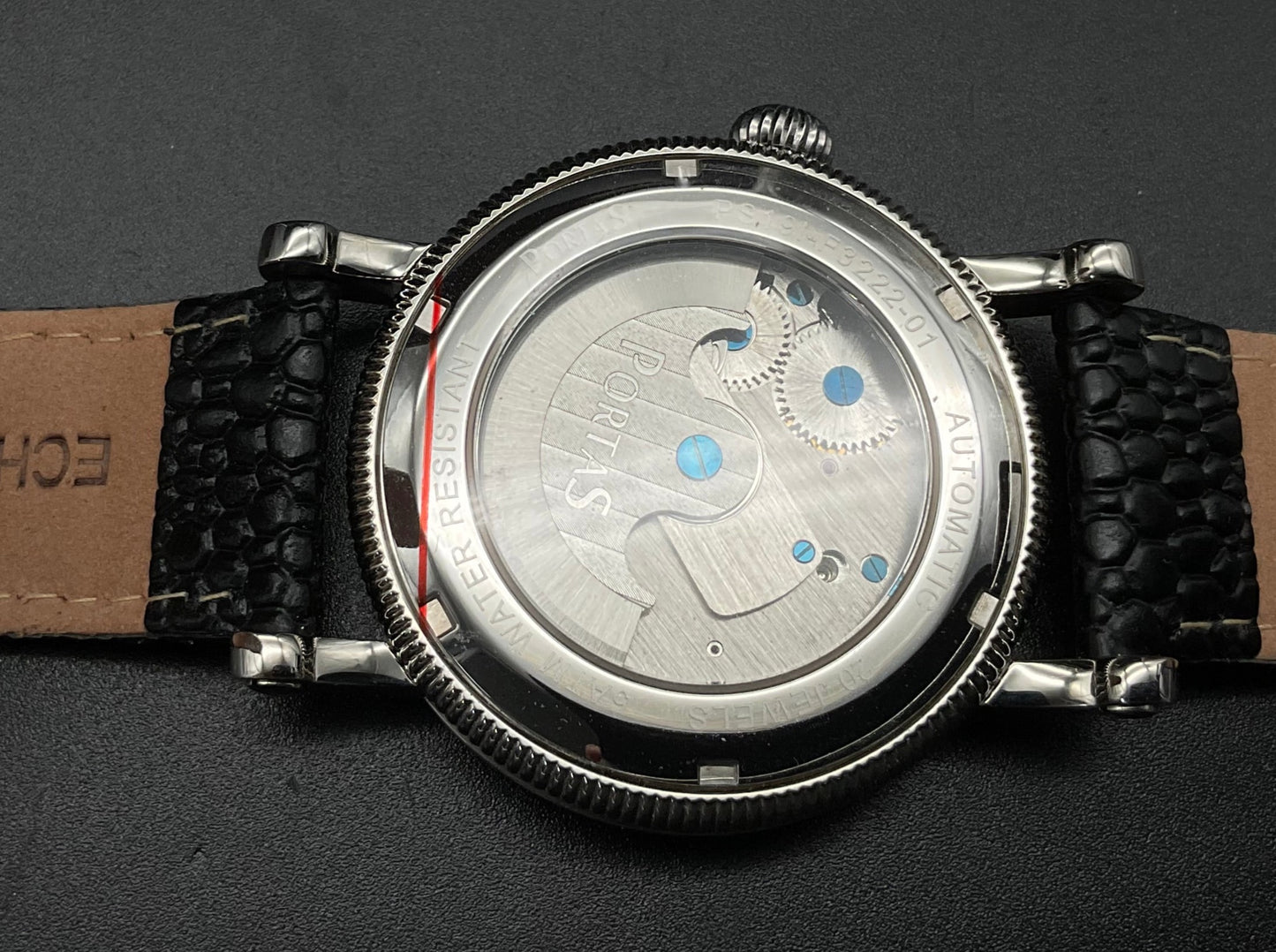 Gold-silberne Portas Uhr