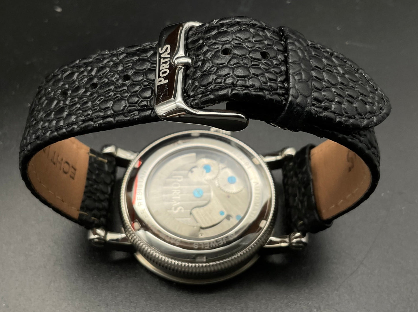 Gold-silberne Portas Uhr