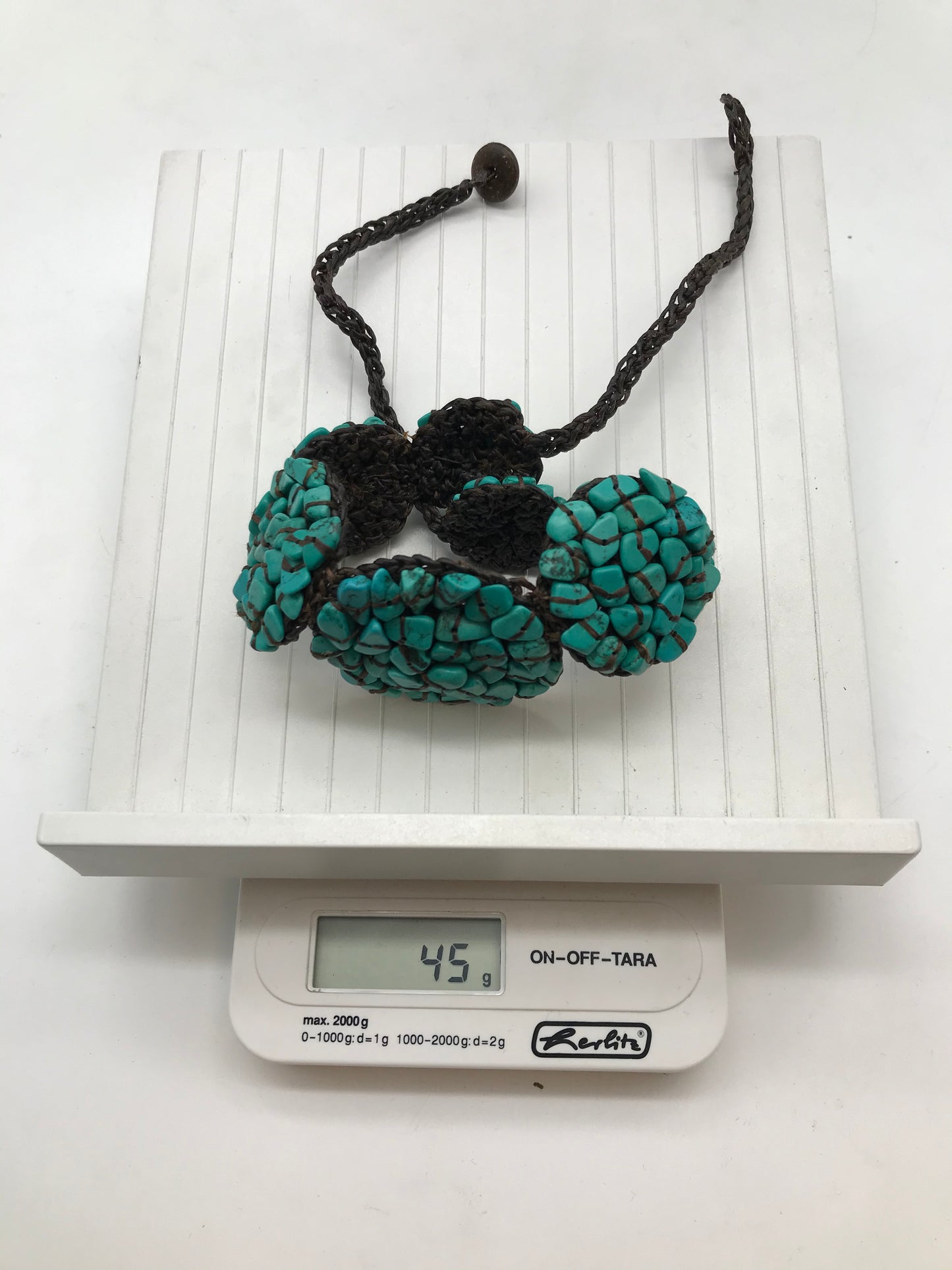 Kette aus Stoff mit Türkisen Steinchen