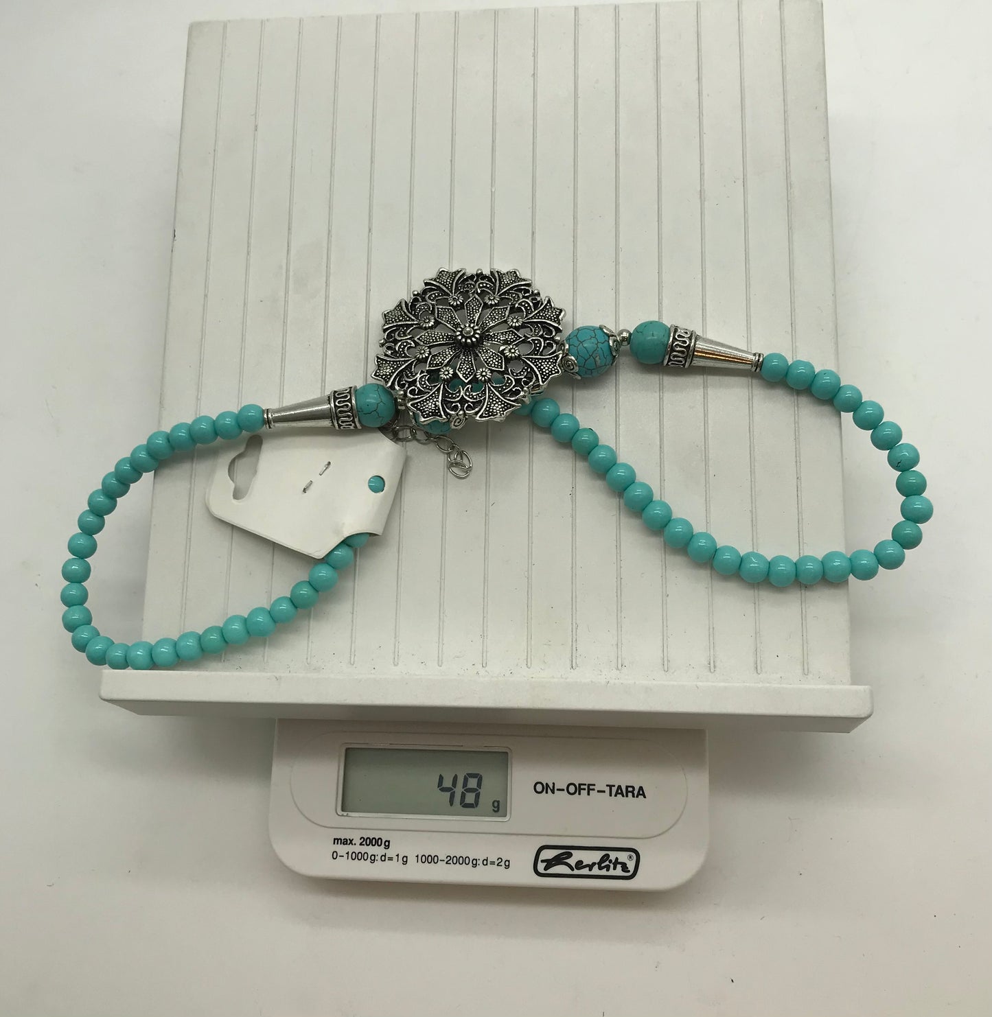 Statement Kette, Modeschmuck, türkis, silber, Blumenanhänger, Fashion Jewelry