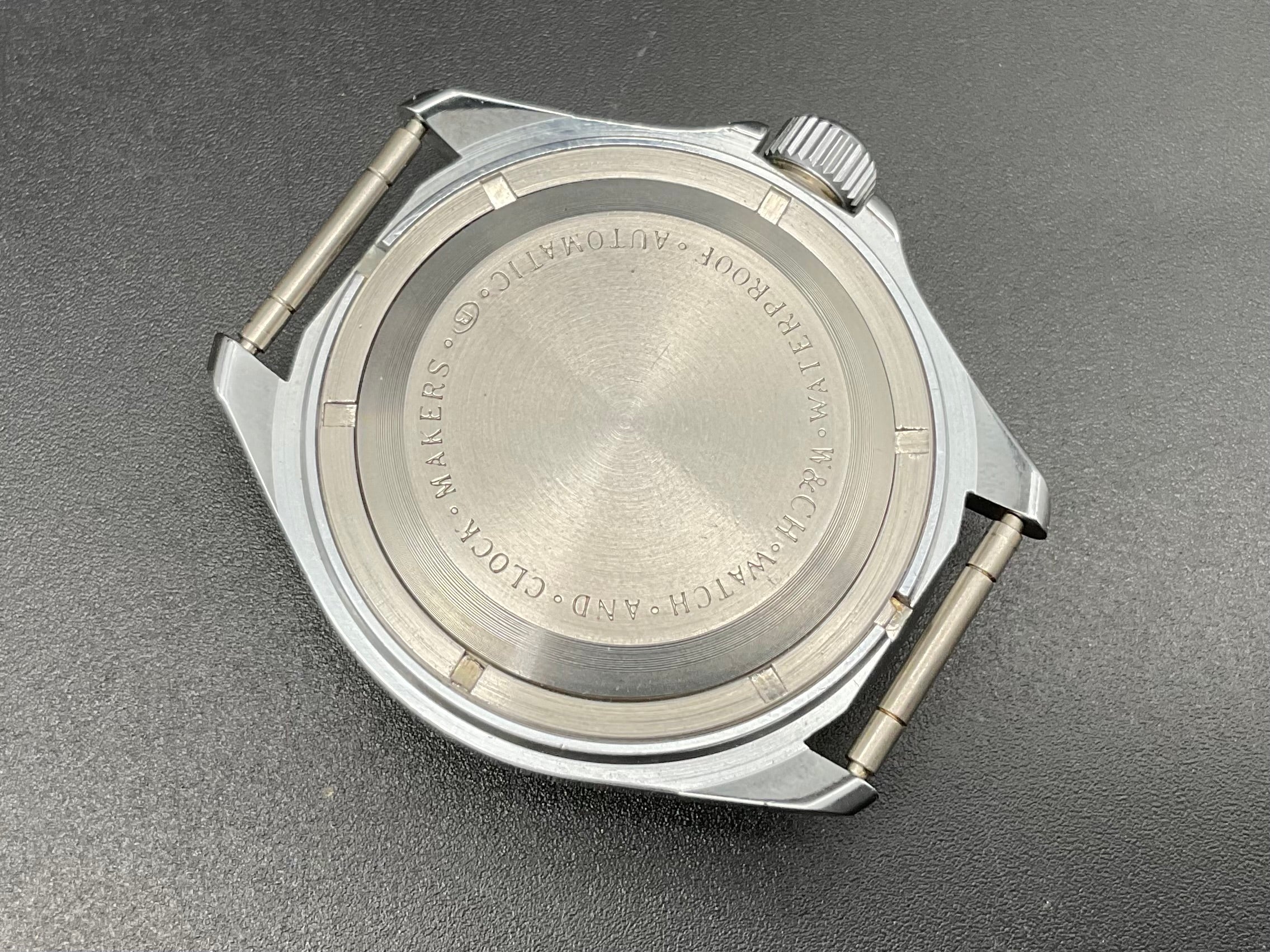 Silberfarbige W&C Uhr                    905