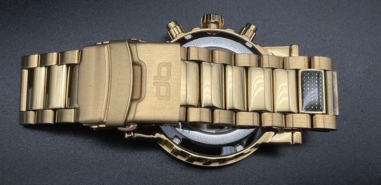 Schwarz-Goldene deLorean Uhr