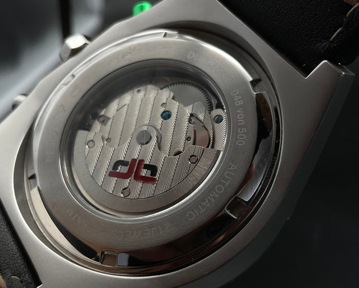 Grün-silberne deLorean Uhr