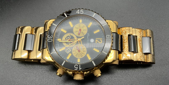 Gold-schwarze Raoul U. Braun Uhr