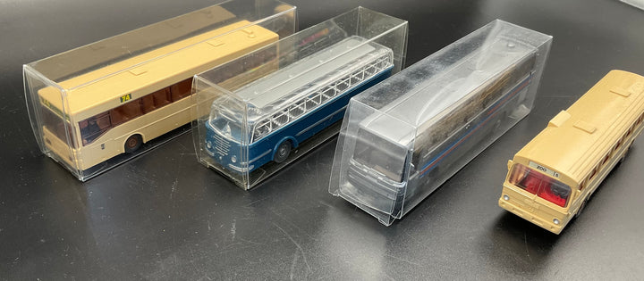 Vier Wiking Modellbusse