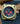 Gold-schwarze deLorean Uhr