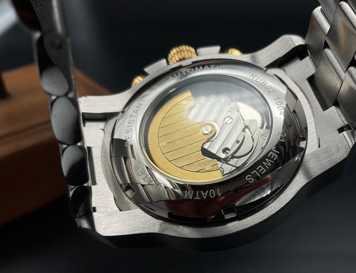 Gold-Silber-blaue Raoul U. Braun Uhr