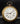 Goldfarbige Wanduhr mit Hänkel