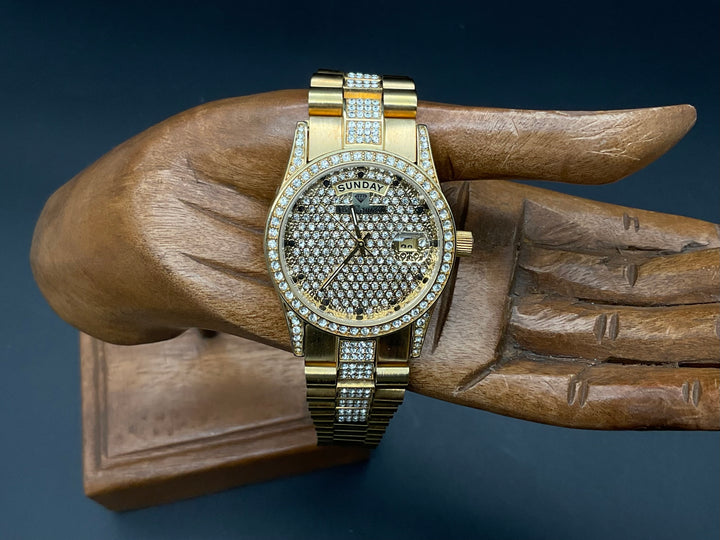 Goldfarbige Yves Camani Quarzuhr Edelstahlband