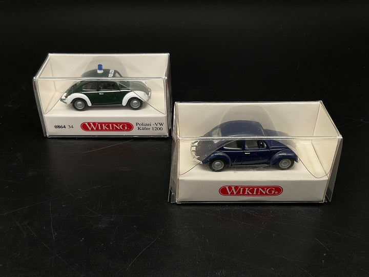 Zwei Wiking VW Käfer