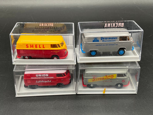 Vier Brekina Modellfahrzeuge