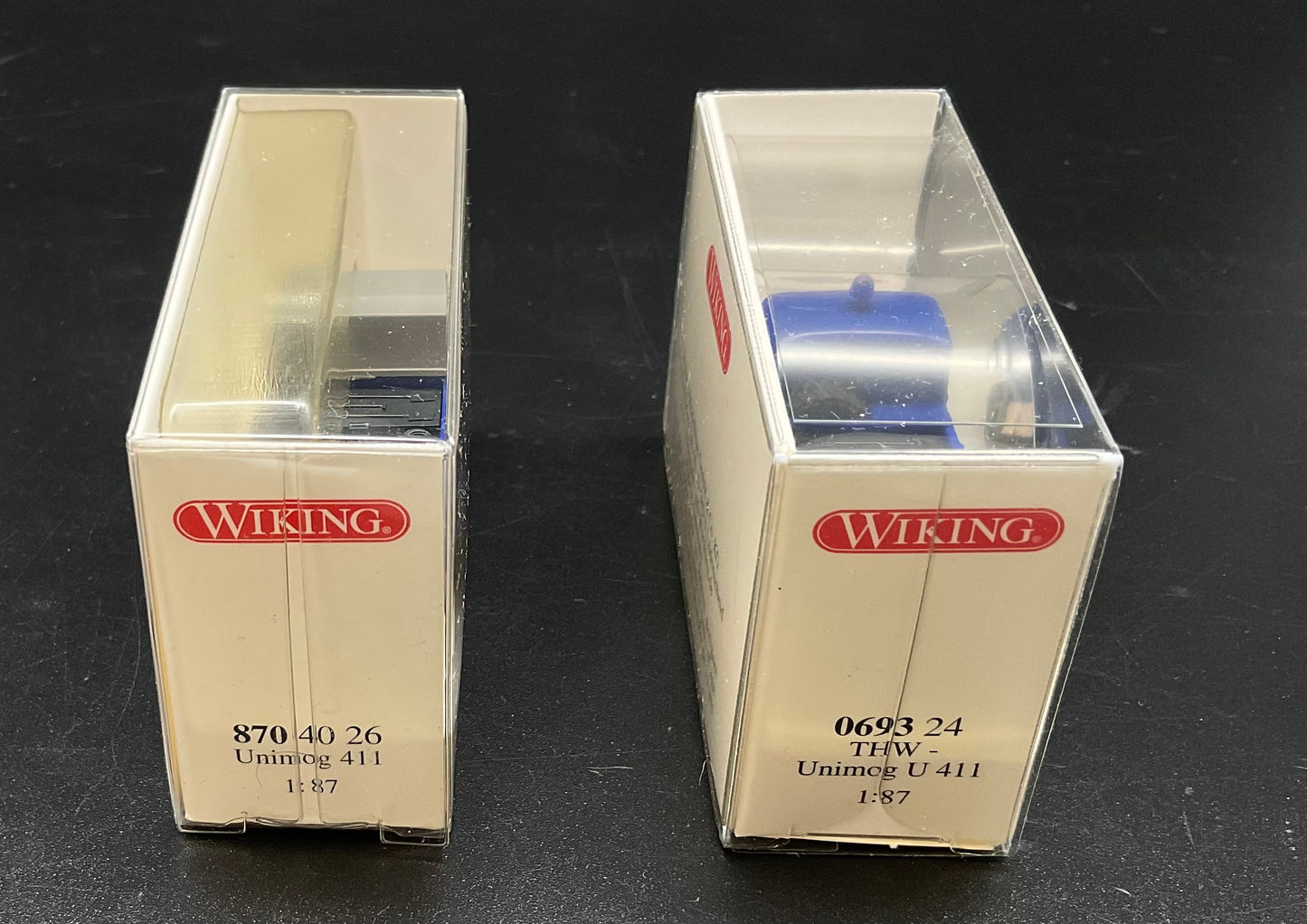 Zwei Wiking Unimogs U 411