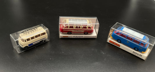 Drei Brekina Modellbusse