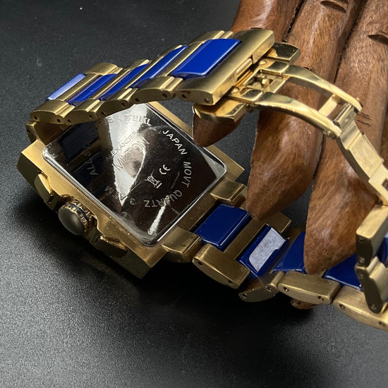 Blau-goldene Alexander Milton Uhr