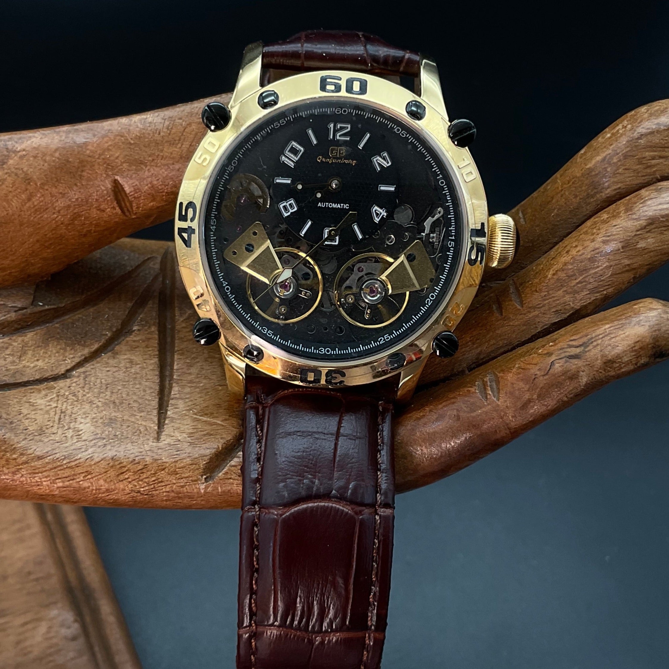 Gold-schwarze Grafenberg Uhr