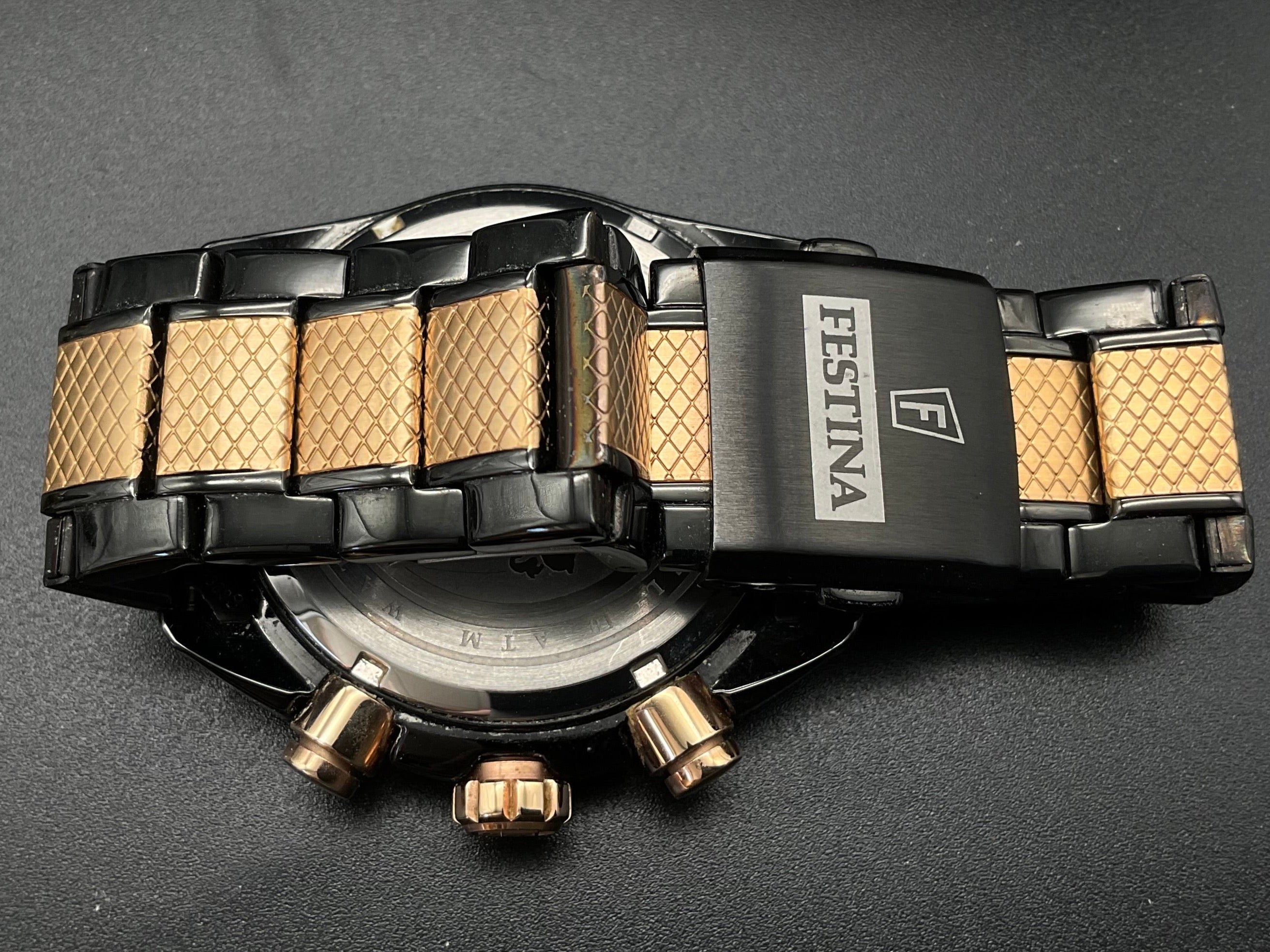 Roségold- schwarze Festina Uhr