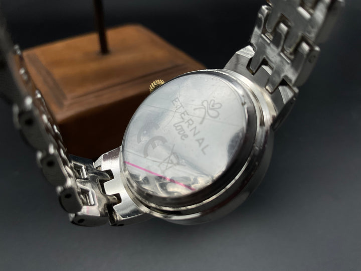 Silber-goldene ETERNAL Love Uhr