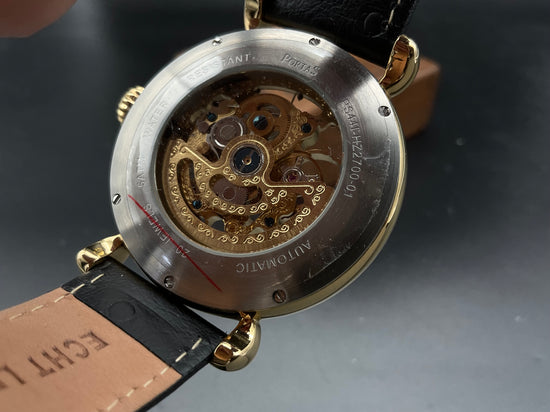 Gold-schwarze Portas Skelettuhr