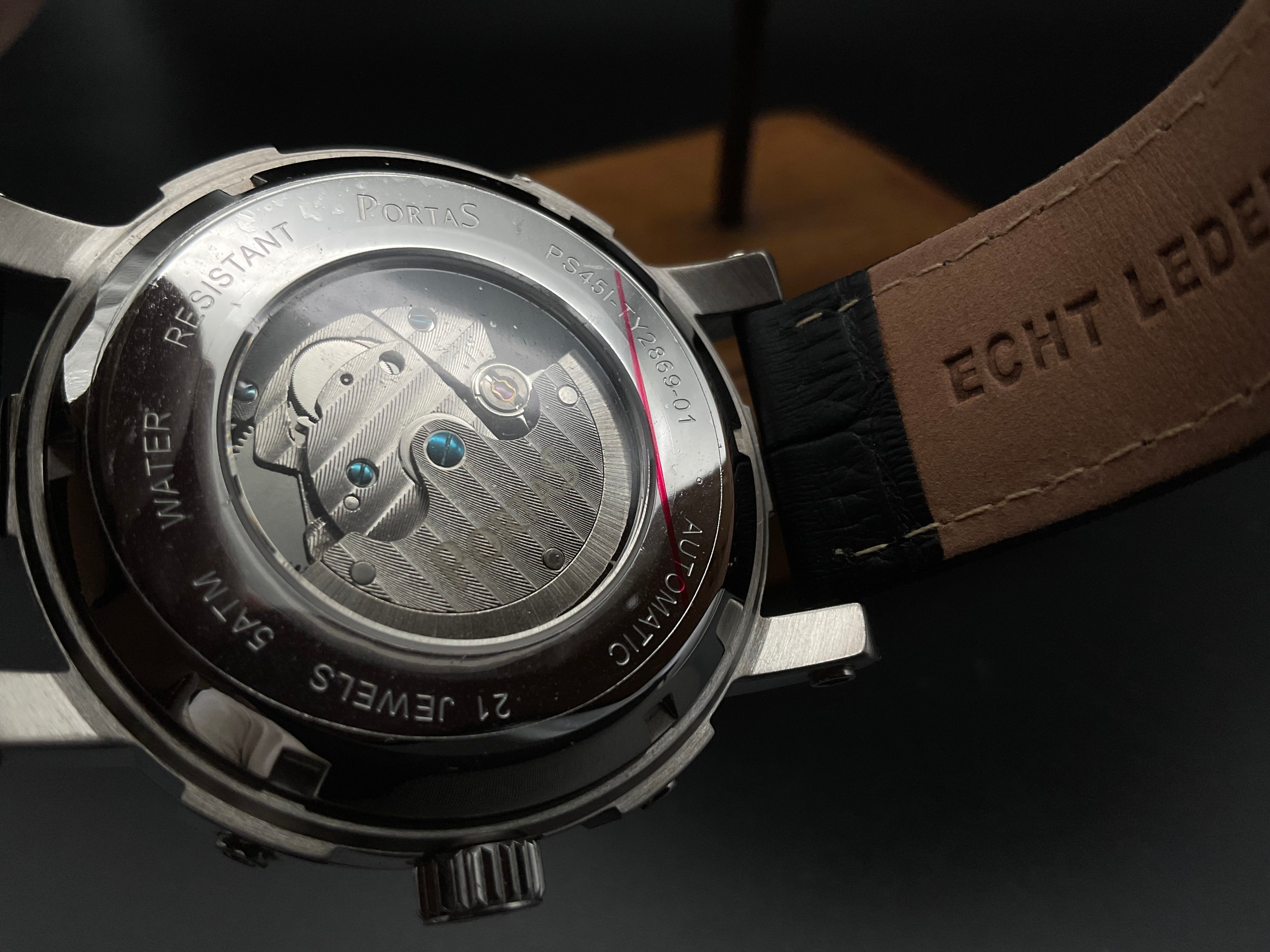 Silber-grüne Portas Uhr