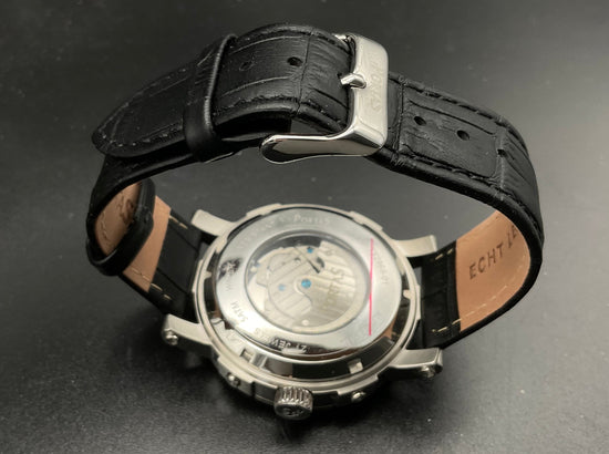 Silber-grüne Portas Uhr