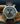 Gold-graue Portas Uhr