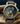 Gold-braune Portas Uhr