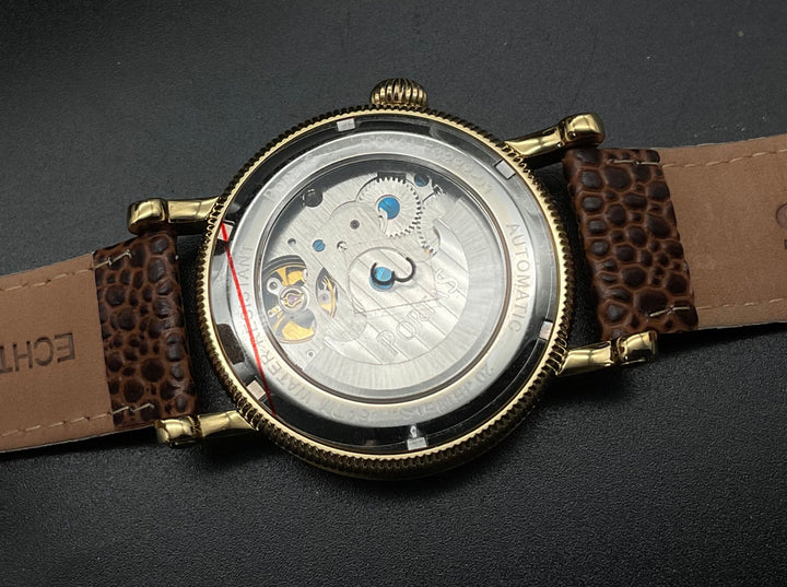 Gold-braune Portas Uhr