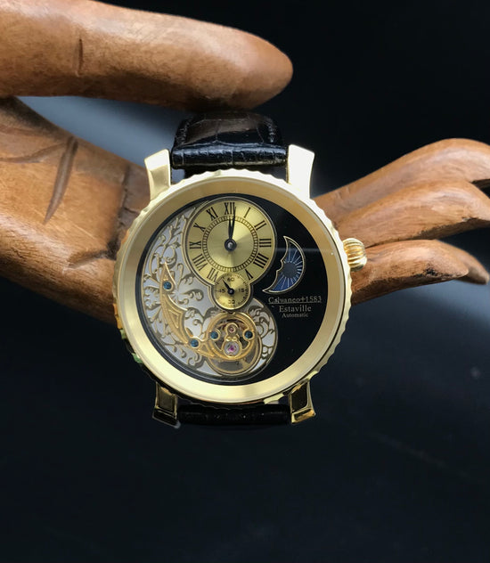 Gold schwarze Calvaneo 1583 Estaville Uhr