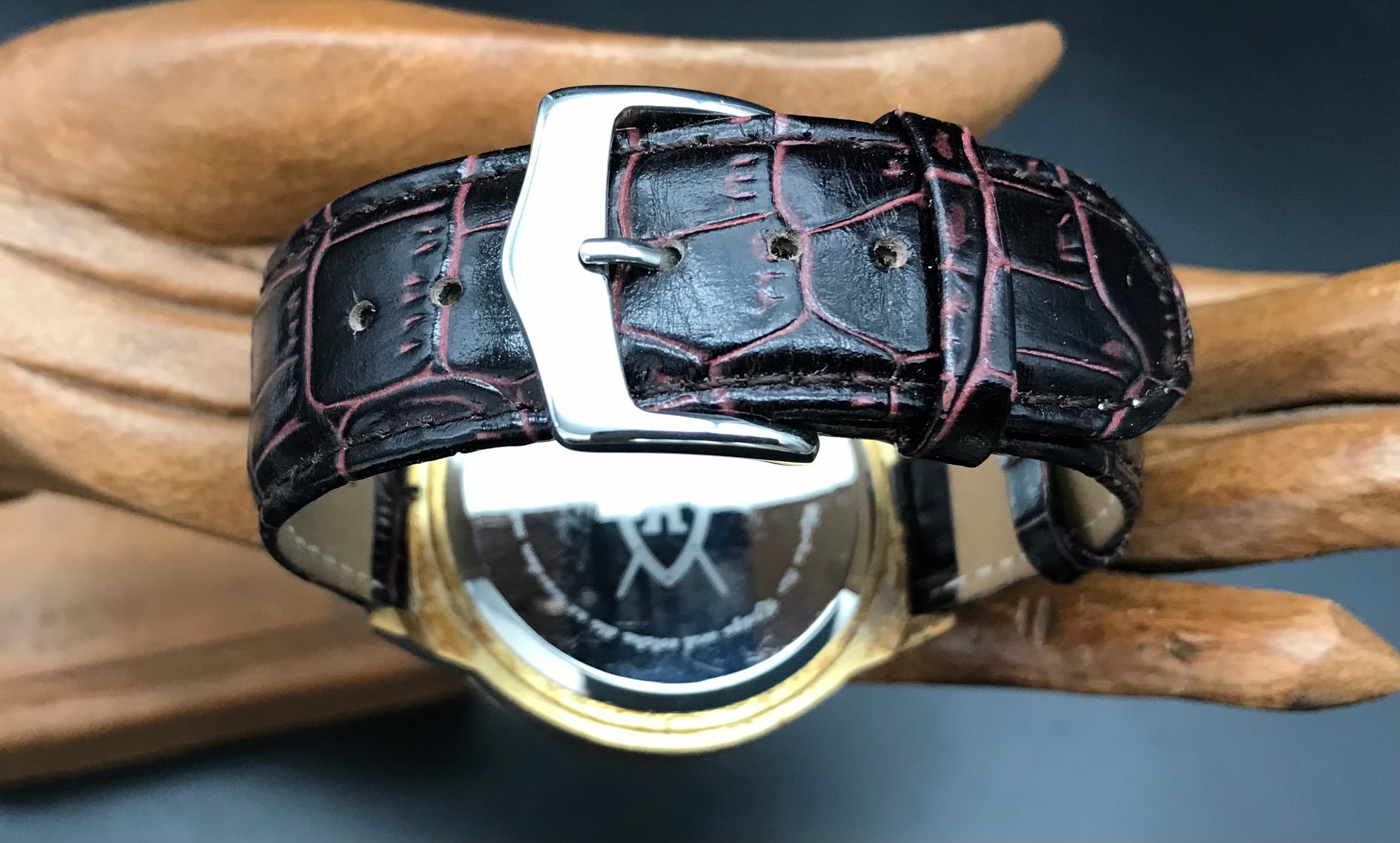 Gold-grüne Königswerk Uhr