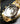 Gold-schwarze Portas Uhr