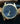 Gold-schwarze YvesCamani Uhr