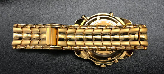 Goldene YvesCamani Uhr