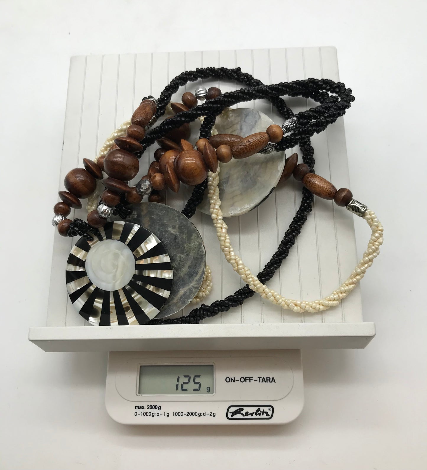 3 x Kette aus Holz,schwarz und weiß, Afrikanischer Look, runde Anhänger, Muschelmotiv