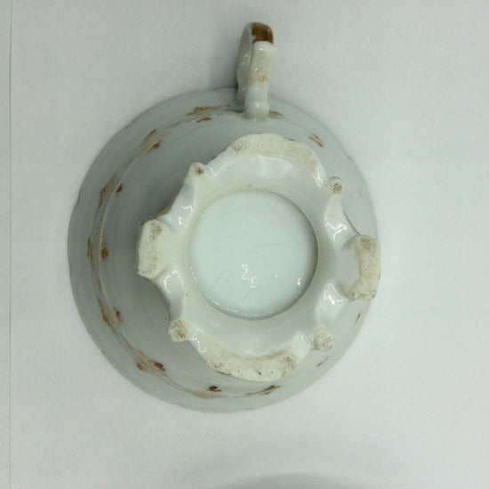 Große Sammeltasse mit Unterteller, Blumenmotiv