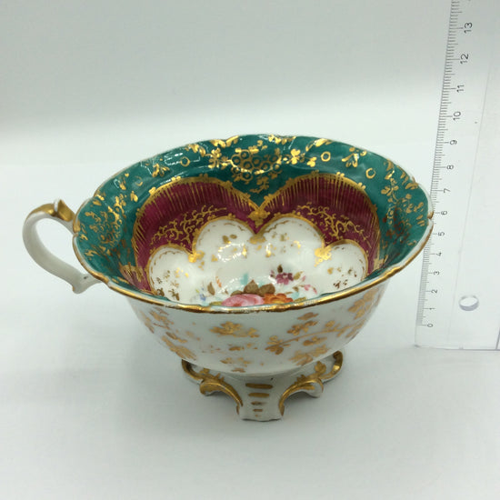 Große Sammeltasse mit Unterteller, Blumenmotiv